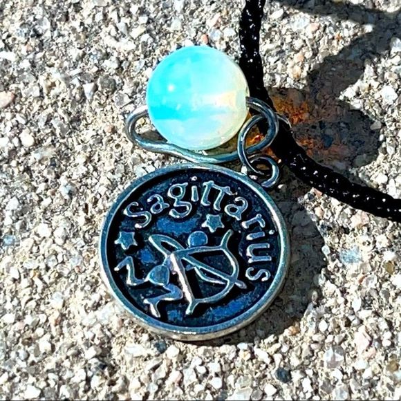 Jewelry - SAGITTARIUS IRON ZODIAC AND MOONSTONE PLANET CHARM BLACK SILK CORD NECKL…